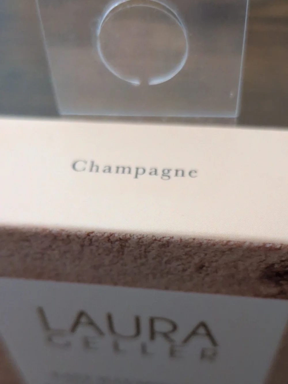 Laura Geller Powder Highlighter Champagne Color